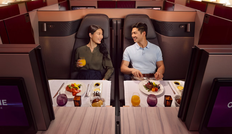 Qatar Qsuite couple